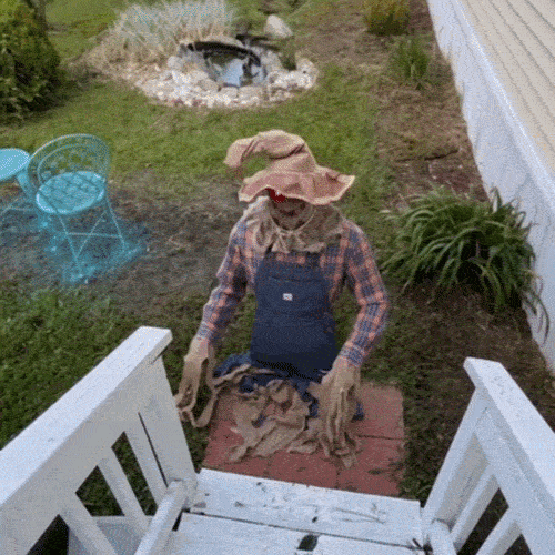 Reference Halloween display inspiration featuring a scarecrow character